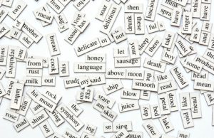 Random collection of different words and word-forms on magnetic tiles