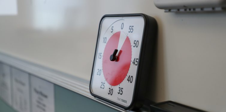Classroom white board displaying countdown timer clock.